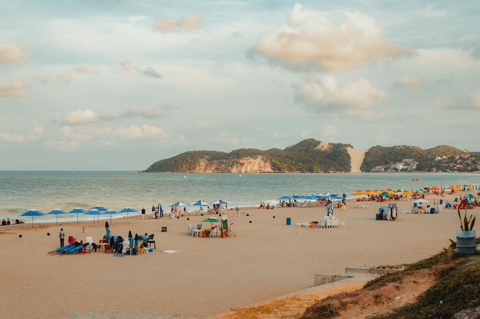 Breathtaking view of Ponta Negra Beach with distant Morro do Careca in Natal, Brazil. Perfect summer getaway.