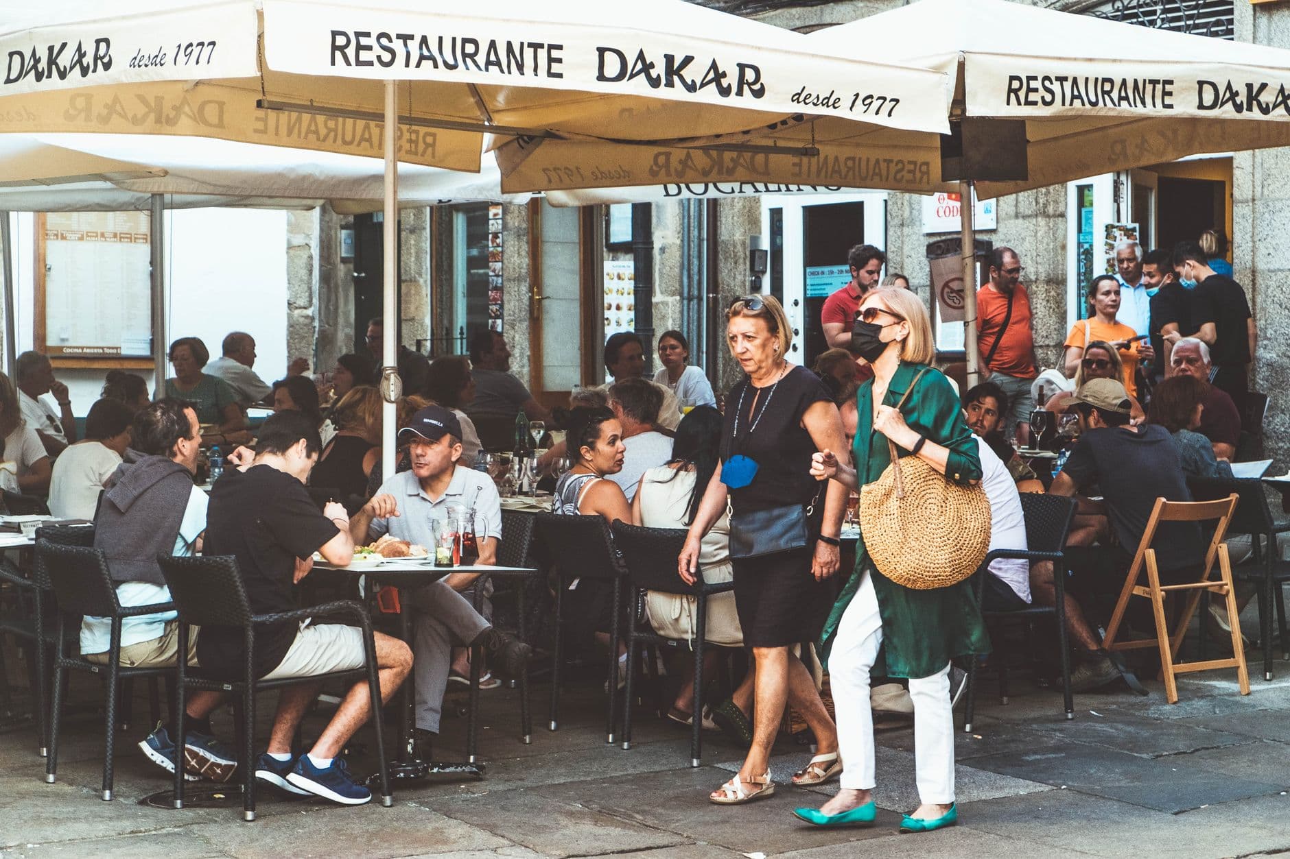 Vibrant outdoor dining at Restaurante Dakar in Santiago de Compostela, Spain.